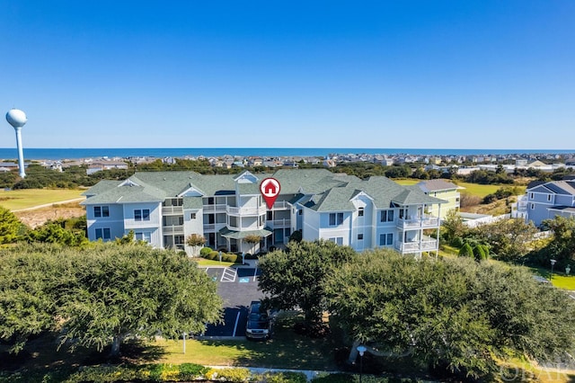 drone / aerial view with a water view