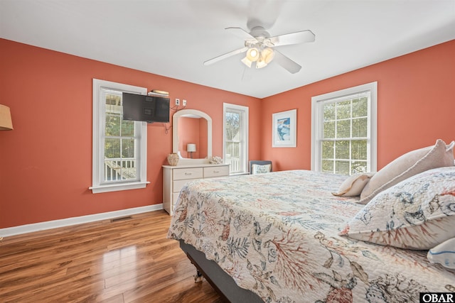 106 Flight Dr Lot 4, Duck, NC 27949 - bedroom with wood finished floors and a ceiling fan