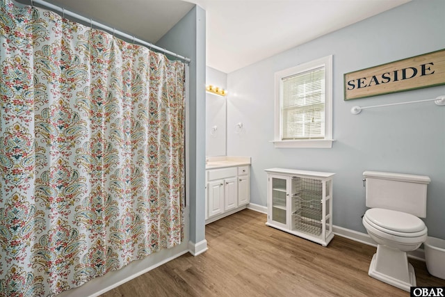 106 Flight Dr Lot 4, Duck, NC 27949 - full bathroom featuring wood finished floors, vanity, and a shower with shower curtain