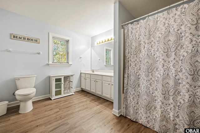 106 Flight Dr Lot 4, Duck, NC 27949 - bathroom featuring vanity, wood finished floors, and curtained shower