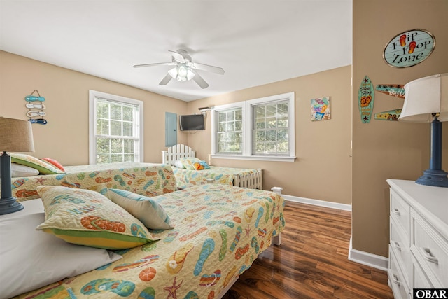 106 Flight Dr Lot 4, Duck, NC 27949 - bedroom with dark wood-style flooring and a ceiling fan