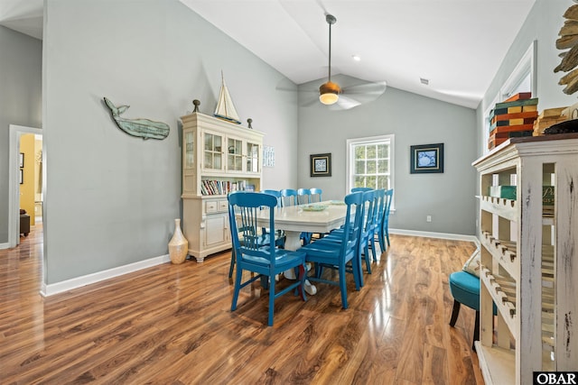 106 Flight Dr Lot 4, Duck, NC 27949 - dining room featuring high vaulted ceiling, wood finished floors, and ceiling fan