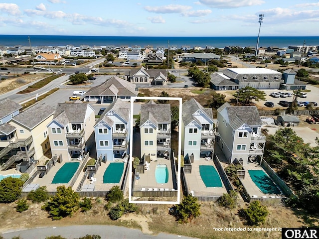 5309 S Sand Wedge Ln Lot 5, Nags Head, NC 27959 - aerial perspective of suburban area with a pool area and a large body of water