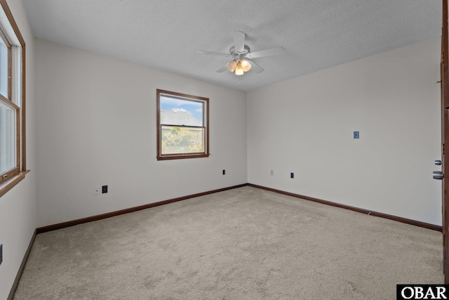 116 W Old Cove Rd Lot 1, Nags Head, NC 27959 - carpeted spare room with a ceiling fan, baseboards, and a textured ceiling