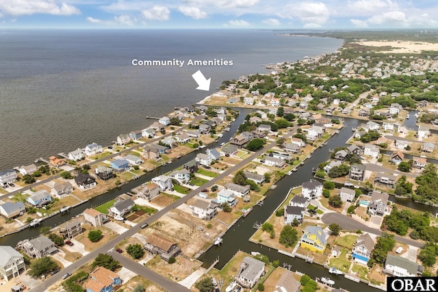 116 W Old Cove Rd Lot 1, Nags Head, NC 27959 - drone / aerial view featuring a water view and a residential view