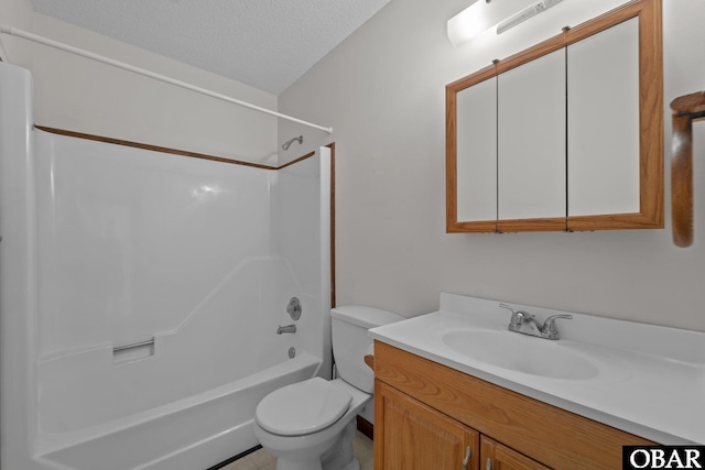 116 W Old Cove Rd Lot 1, Nags Head, NC 27959 - bathroom with vanity, toilet, a textured ceiling, and washtub / shower combination