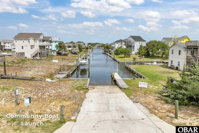 116 W Old Cove Rd Lot 1, Nags Head, NC 27959 - dock area with a water view and a residential view