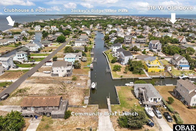 116 W Old Cove Rd Lot 1, Nags Head, NC 27959 - drone / aerial view featuring a water view and a residential view