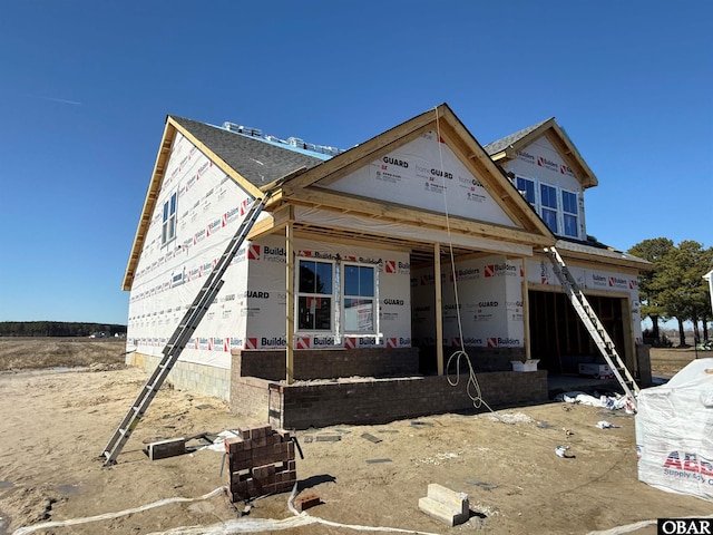 property in mid-construction with a garage