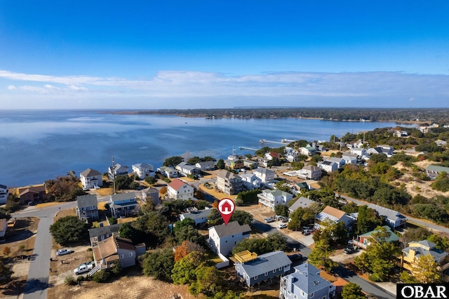 aerial view with a residential view and a water view