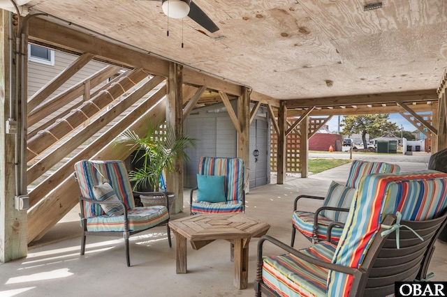 view of patio featuring ceiling fan