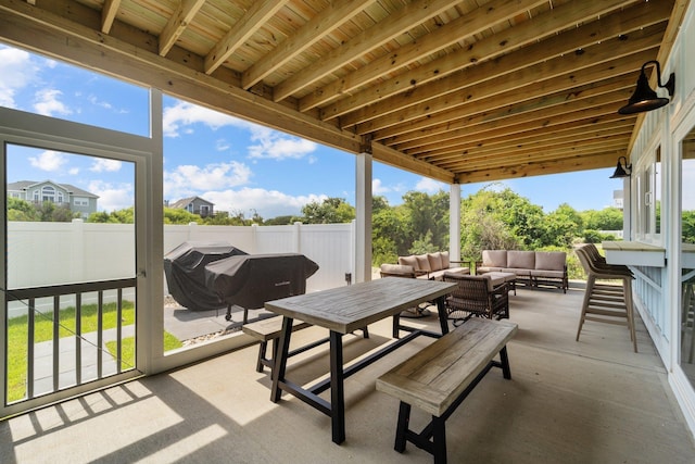 view of patio featuring a fenced backyard and an outdoor hangout area