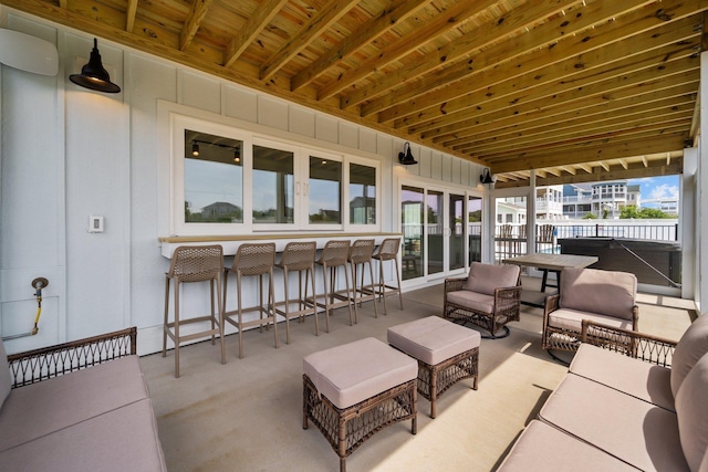 view of patio / terrace featuring outdoor dry bar and outdoor lounge area