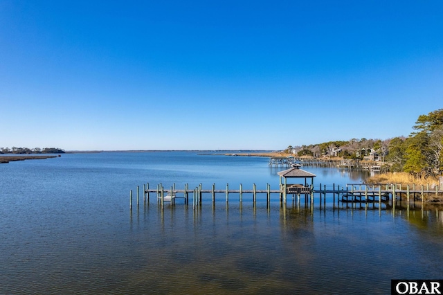 view of dock with a water view