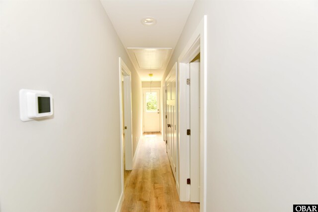 112 Mybet Ct Lot 100, Kill Devil Hills, NC 27948 - hallway with attic access, light wood-type flooring, and baseboards
