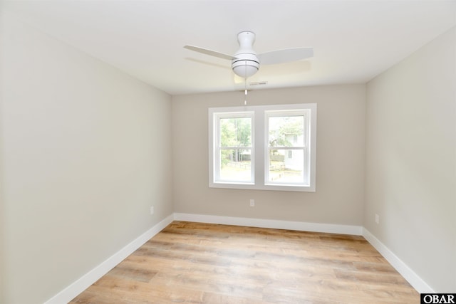 112 Mybet Ct Lot 100, Kill Devil Hills, NC 27948 - empty room with a ceiling fan, light wood-type flooring, and baseboards