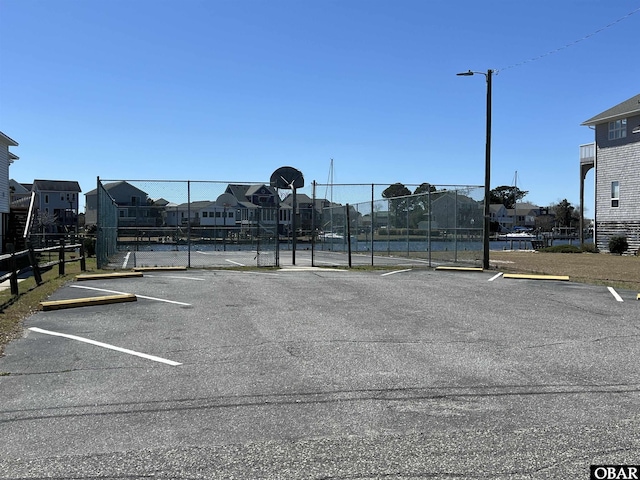 112 Mybet Ct Lot 100, Kill Devil Hills, NC 27948 - uncovered parking lot with a residential view
