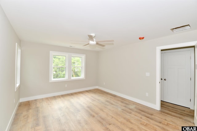 112 Mybet Ct Lot 100, Kill Devil Hills, NC 27948 - empty room featuring light wood-type flooring, a ceiling fan, and baseboards