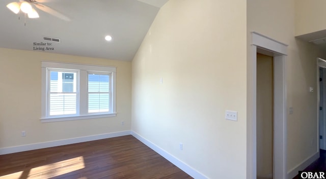 empty room with visible vents, baseboards, lofted ceiling, dark wood-style floors, and recessed lighting