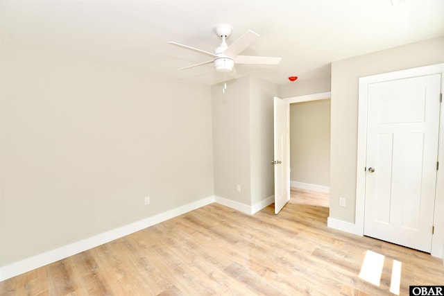 112 Mybet Ct Lot 100, Kill Devil Hills, NC 27948 - unfurnished bedroom featuring light wood-type flooring, baseboards, and a ceiling fan