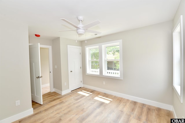 112 Mybet Ct Lot 100, Kill Devil Hills, NC 27948 - unfurnished bedroom with light wood-style floors and ceiling fan