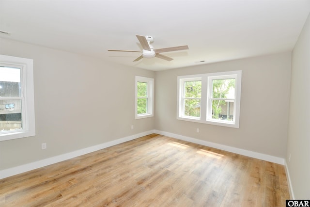 112 Mybet Ct Lot 100, Kill Devil Hills, NC 27948 - spare room with baseboards, light wood-style flooring, and ceiling fan