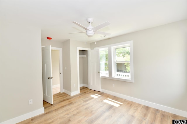 112 Mybet Ct Lot 100, Kill Devil Hills, NC 27948 - unfurnished bedroom featuring baseboards, light wood-style flooring, and a closet