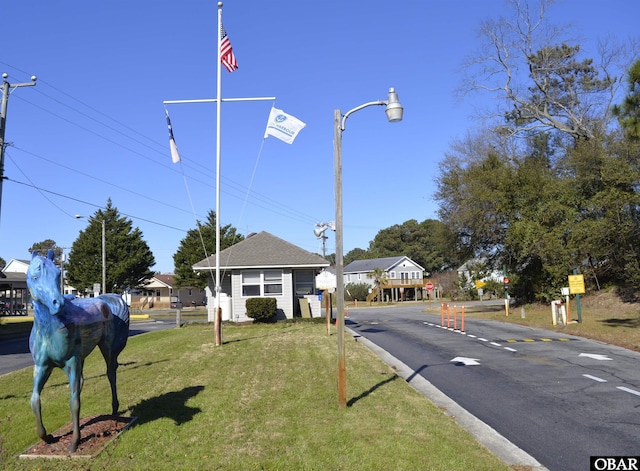 112 Mybet Ct Lot 100, Kill Devil Hills, NC 27948 - view of asphalt road featuring traffic signs and street lights