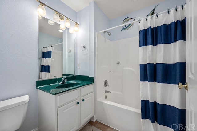 full bathroom featuring tile patterned flooring, toilet, shower / bathtub combination with curtain, and vanity