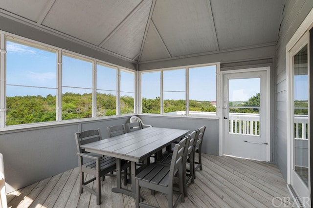 sunroom / solarium with vaulted ceiling