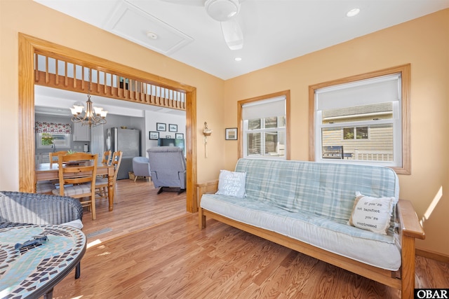 227 Outrigger Dr Lot 132, Kill Devil Hills, NC 27948 - living room with light wood-style floors, recessed lighting, a notable chandelier, and baseboards