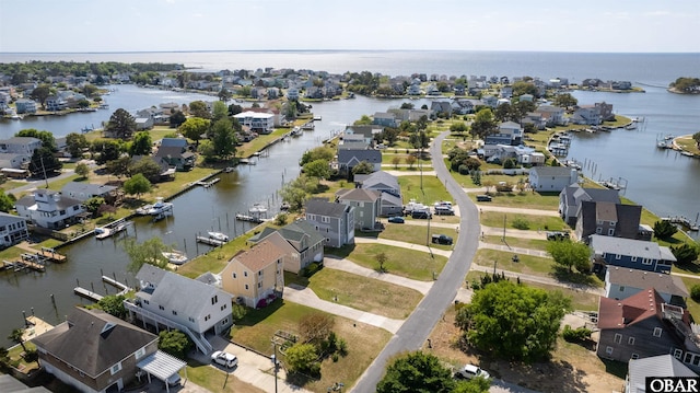 227 Outrigger Dr Lot 132, Kill Devil Hills, NC 27948 - birds eye view of property with a water view and a residential view
