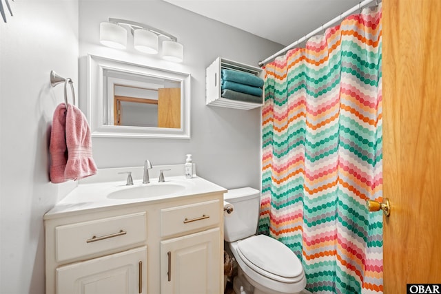 227 Outrigger Dr Lot 132, Kill Devil Hills, NC 27948 - bathroom featuring toilet, a shower with curtain, and vanity