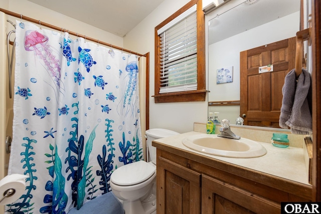 718 Canal Dr Lot 308, Kill Devil Hills, NC 27948 - full bathroom featuring toilet, vanity, and a shower with shower curtain