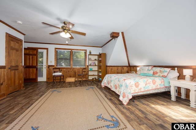 718 Canal Dr Lot 308, Kill Devil Hills, NC 27948 - bedroom featuring wood finished floors, a wainscoted wall, wood walls, ornamental molding, and a ceiling fan