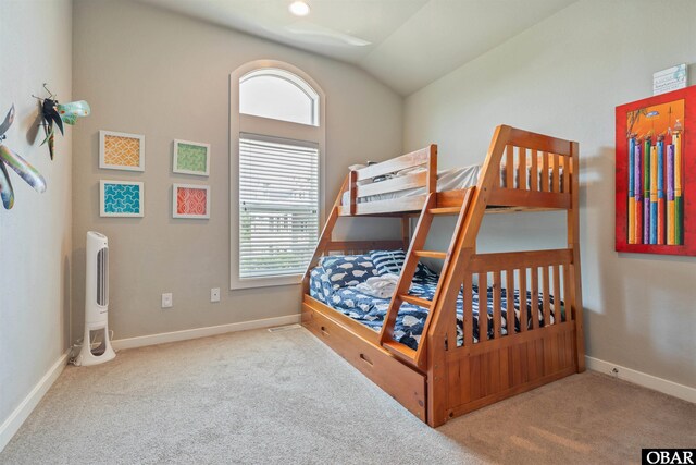 998 Cane Garden Bay Cir Lot 39, Corolla, NC 27927 - carpeted bedroom featuring vaulted ceiling and baseboards