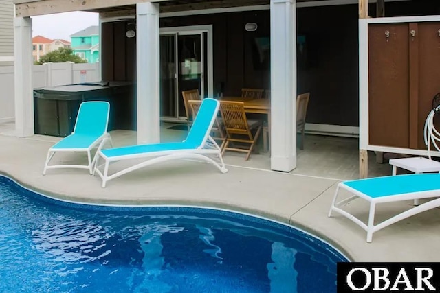 outdoor pool with a patio