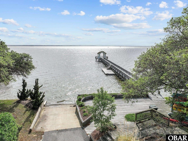 dock area featuring a water view and a boat ramp