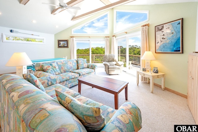 living room with ceiling fan, beam ceiling, high vaulted ceiling, baseboards, and carpet