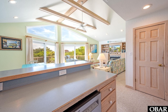 interior space with recessed lighting, a ceiling fan, carpet, and open floor plan