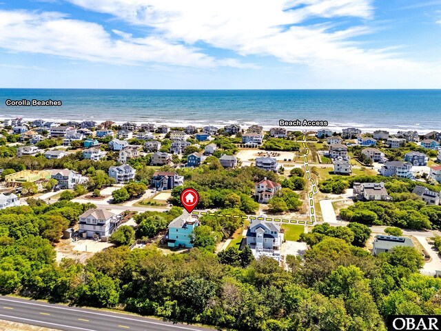 aerial view featuring a water view and a residential view