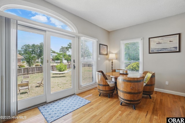 107 Magnolia Dr Lot 75, 76, 77, Camden, NC 27921 - living area featuring wood-type flooring, baseboards, and a textured ceiling