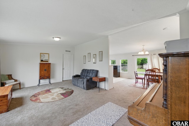 138 Swains Ln Lot 3, Barco, NC 27917 - carpeted living room with a chandelier
