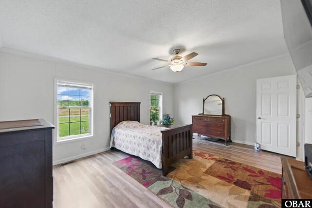 138 Swains Ln Lot 3, Barco, NC 27917 - bedroom featuring light wood-type flooring, ornamental molding, baseboards, and ceiling fan