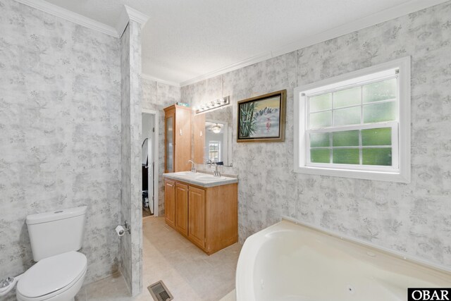 138 Swains Ln Lot 3, Barco, NC 27917 - full bathroom featuring vanity, ornamental molding, a bath, toilet, and wallpapered walls