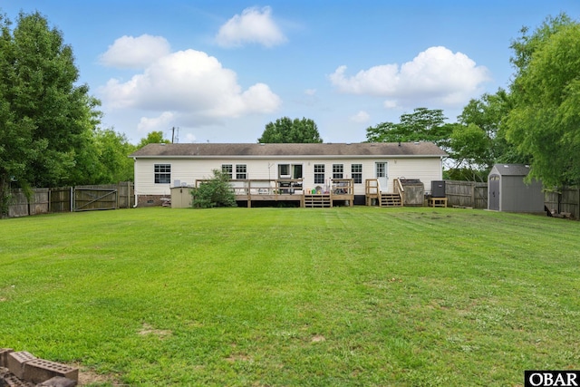 138 Swains Ln Lot 3, Barco, NC 27917 - rear view of property featuring a wooden deck, a gate, and crawl space