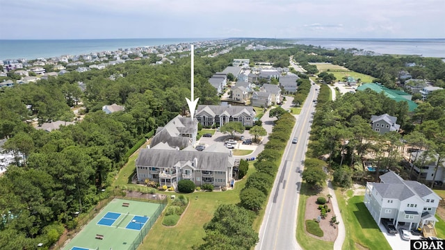 birds eye view of property featuring a water view and a residential view