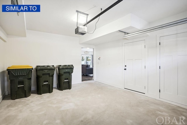 home theater featuring a garage and concrete flooring