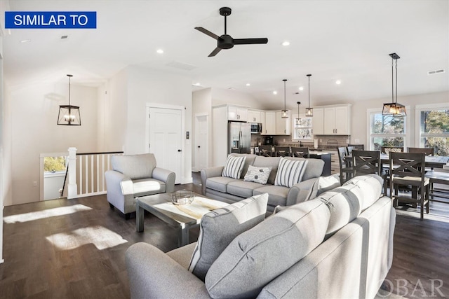 living room with recessed lighting, visible vents, lofted ceiling, dark wood-type flooring, and ceiling fan with notable chandelier