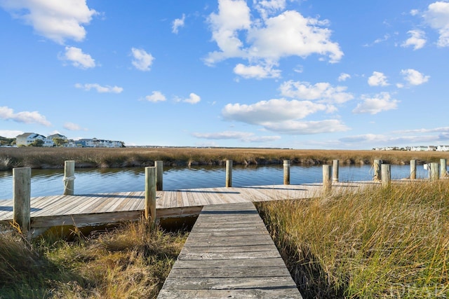 view of dock with a water view